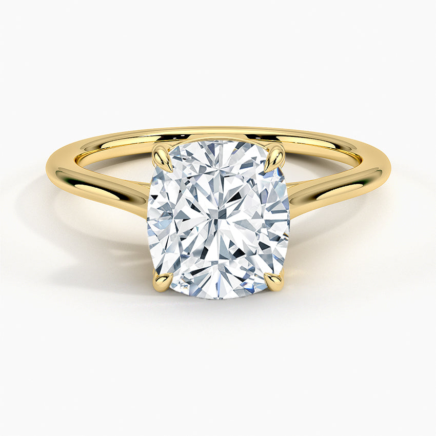 Petite Four Prong Solitaire Cushion Moissanite Ring