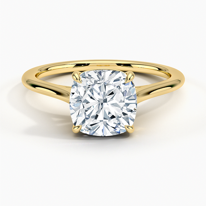 Petite Four Prong Solitaire Cushion Moissanite Ring