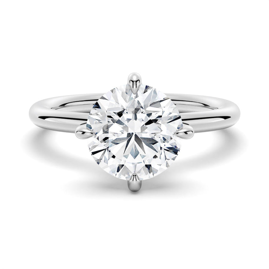 Classic Four-Prong Solitaire Moissanite Engagement Ring