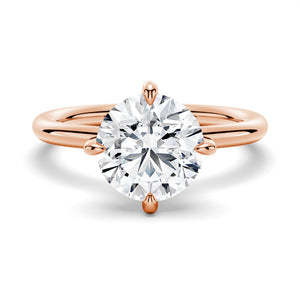 Classic Four-Prong Solitaire Moissanite Engagement Ring