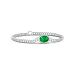 Halo Oval Emerald Bracelet with Octagonal