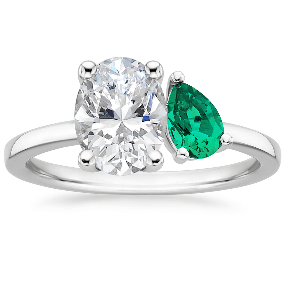 Oval and Pear Cut Emerald Engagement Ring