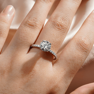 Pavé Set Round Moissanite Engagement Ring With Hidden Halo