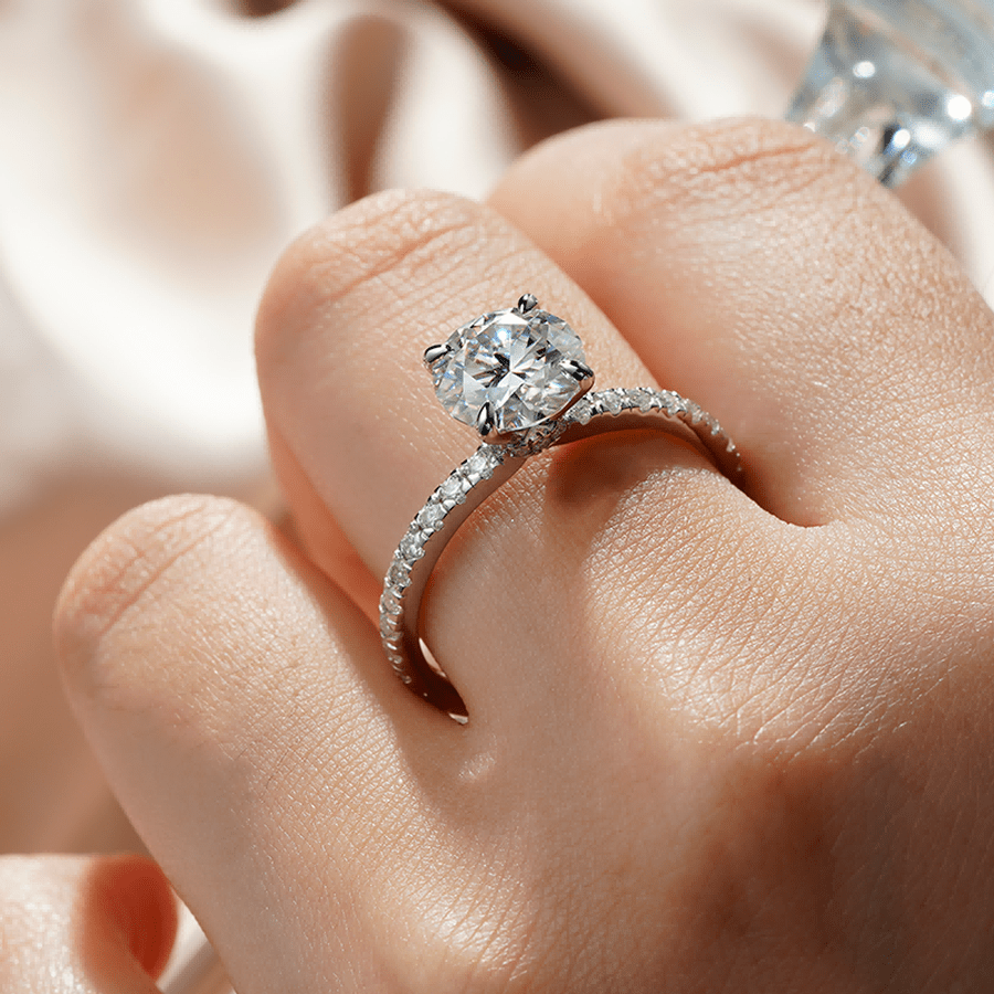 Pavé Set Round Moissanite Engagement Ring With Hidden Halo