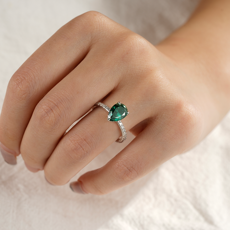 Pear-Shaped Emerald Engagement Ring With Hidden Halo