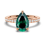 Pear-Shaped Emerald Ring With Hidden Halo