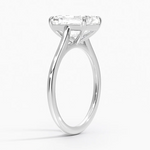 Petite Four Prong Solitaire Emerald Moissanite Ring