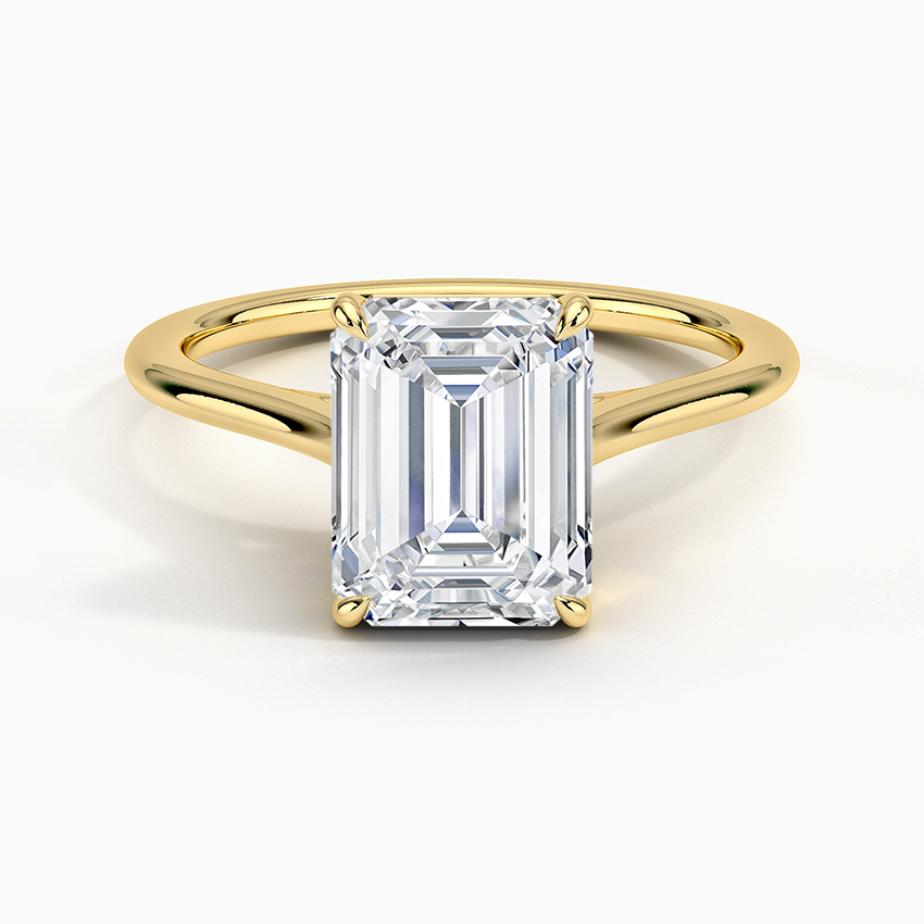 Petite Four Prong Solitaire Emerald Moissanite Ring