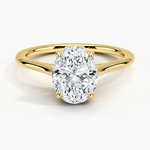 Petite Four Prong Solitaire Oval Moissanite Ring