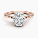 Petite Four Prong Solitaire Oval Moissanite Ring
