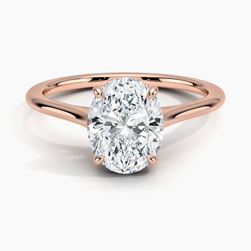 Petite Four Prong Solitaire Oval Moissanite Ring