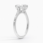 Petite Four Prong Solitaire Oval Moissanite Ring