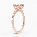 Petite Four Prong Solitaire Oval Moissanite Ring