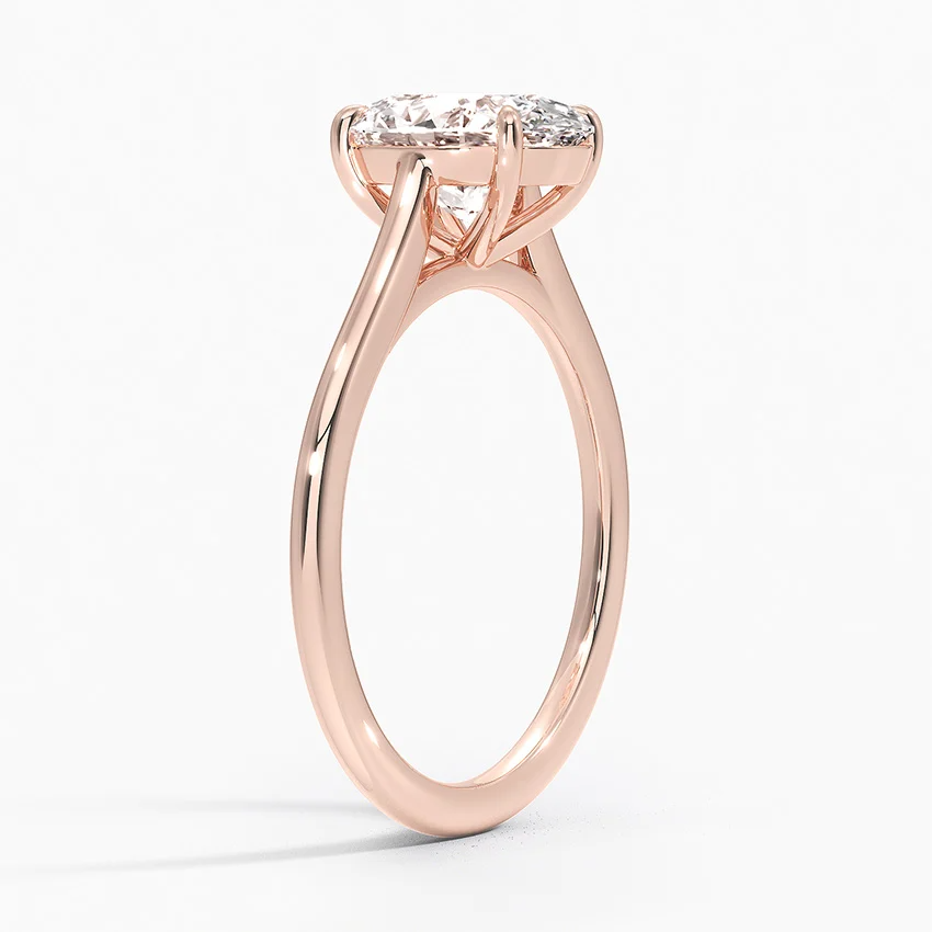 Petite Four Prong Solitaire Oval Moissanite Ring
