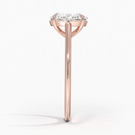 Petite Four Prong Solitaire Oval Moissanite Ring