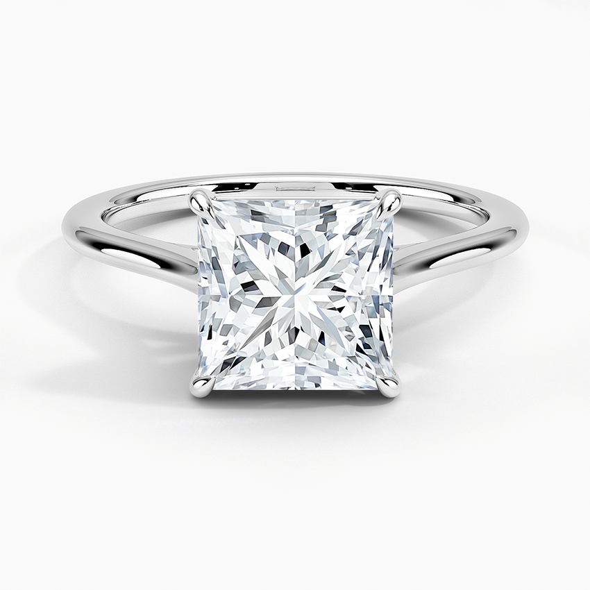 Petite Four Prong Solitaire Princess Moissanite Ring