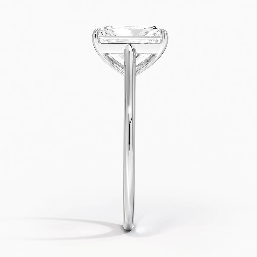 Petite Four Prong Solitaire Radiant Moissanite Ring