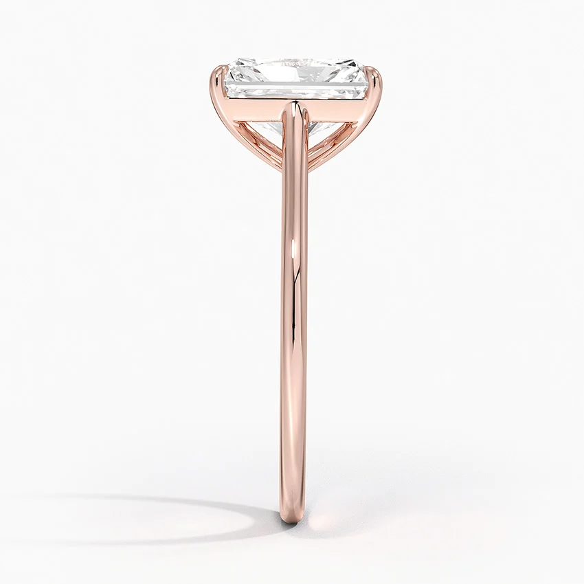Petite Four Prong Solitaire Radiant Moissanite Ring