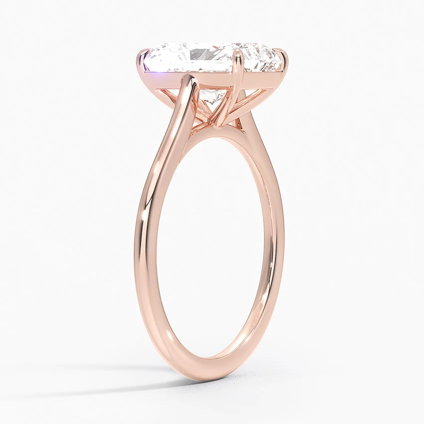 Petite Four Prong Solitaire Radiant Moissanite Ring