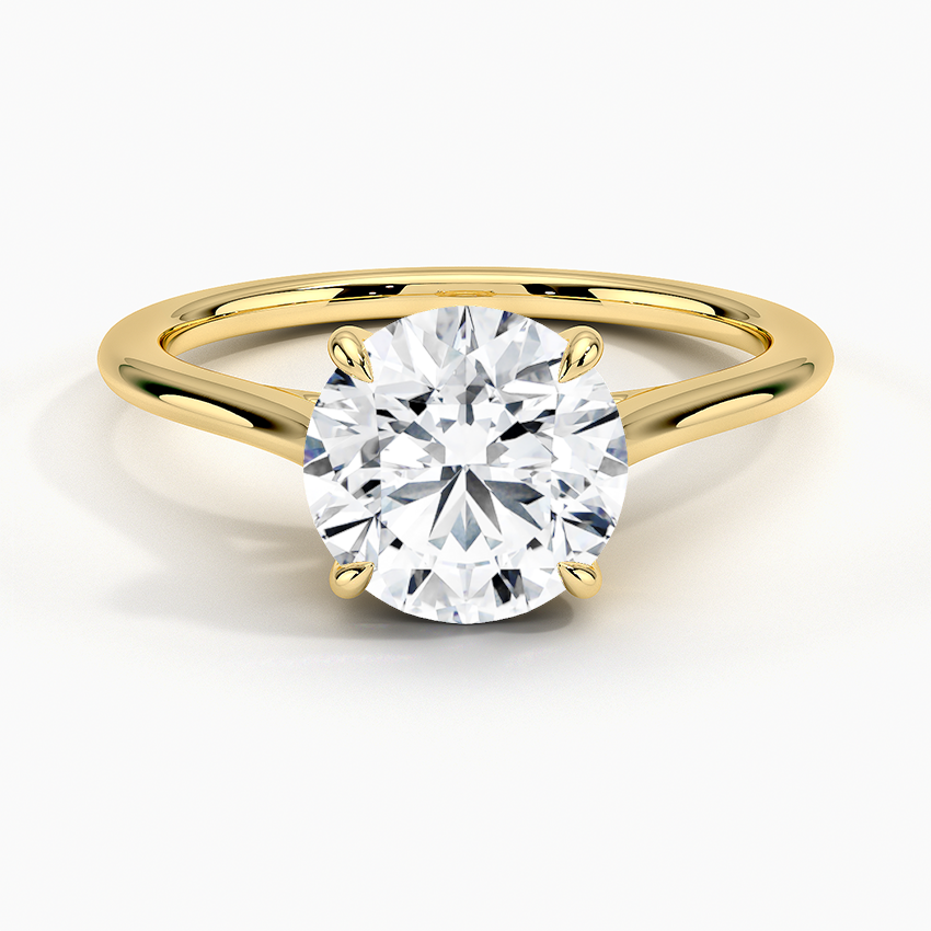 Petite Four Prong Solitaire Round Moissanite Ring