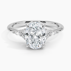 Petite Oval Shaped Moissanite Engagement Ring with Accent Stones