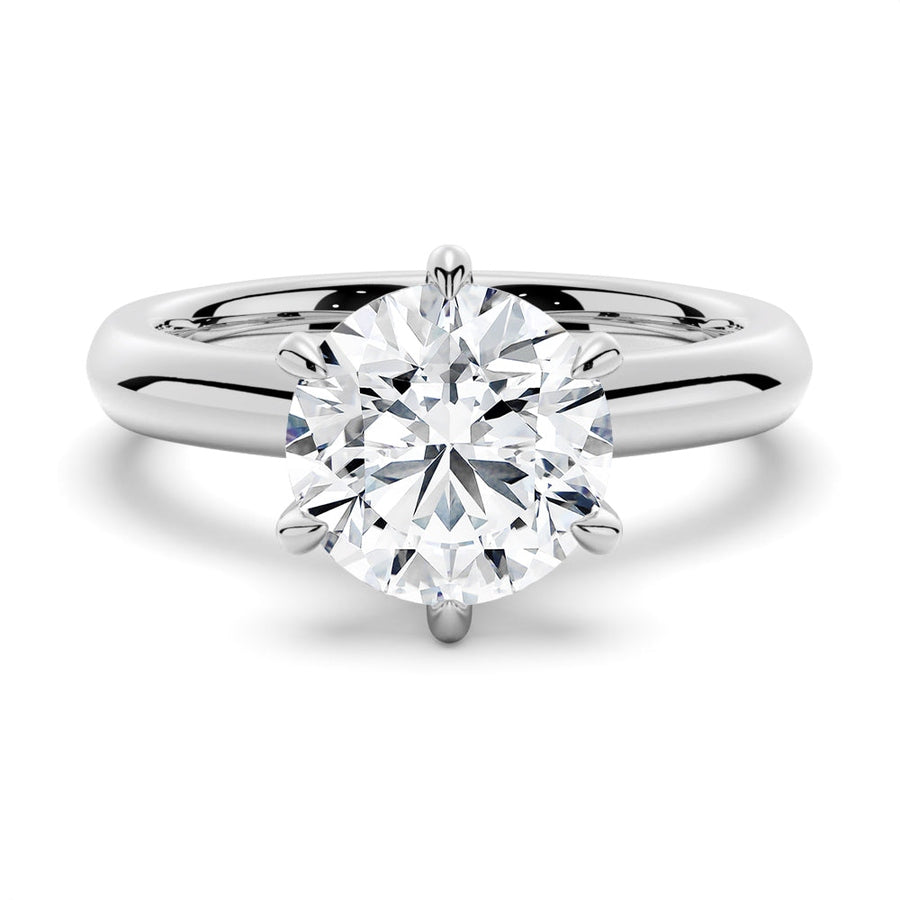 Six-Prong Round Moissanite Engagement Ring With Hidden Sapphire