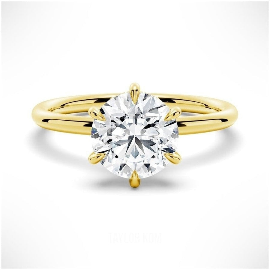 Six-Prong Solitaire Round Cut Engagement Ring With Hidden Halo