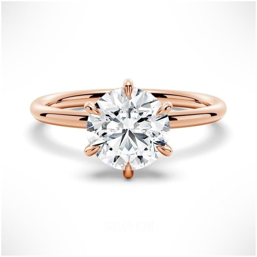 Six-Prong Solitaire Round Cut Engagement Ring With Hidden Halo