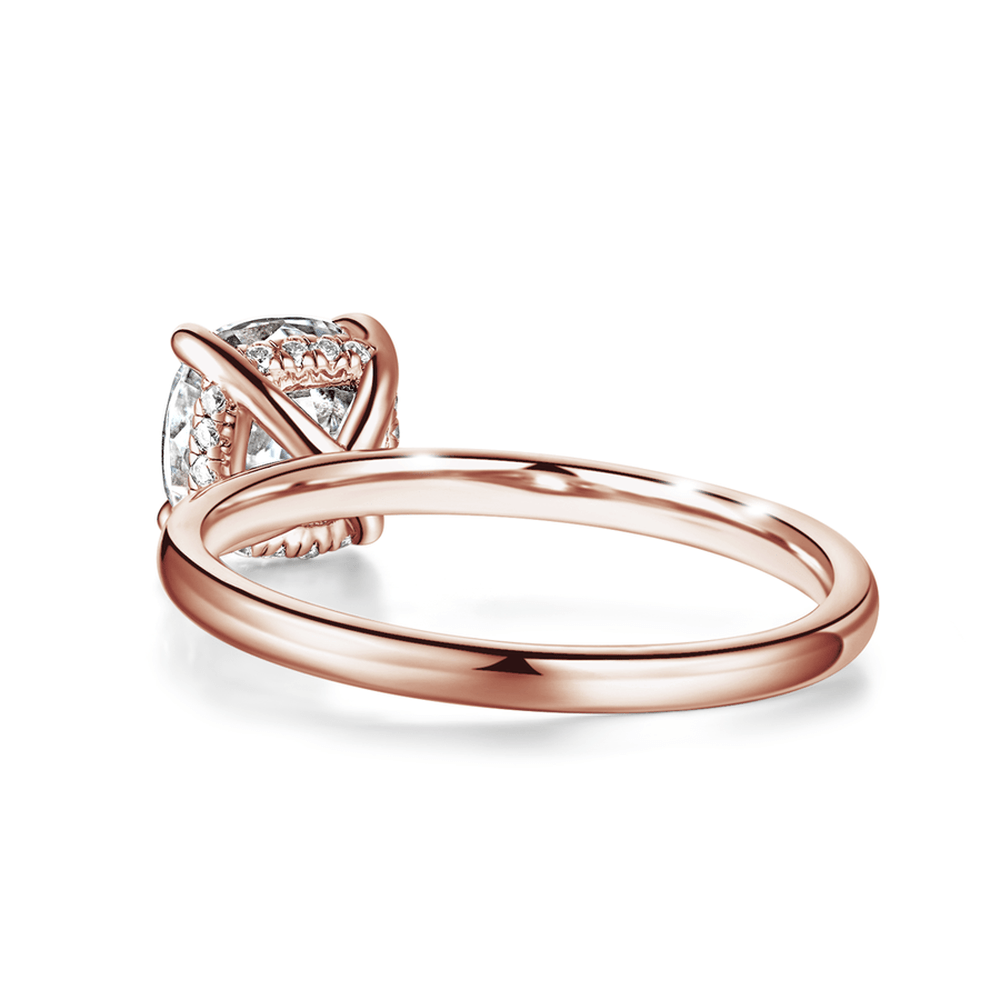 Solitaire Cushion Cut Engagement Ring With Hidden Halo