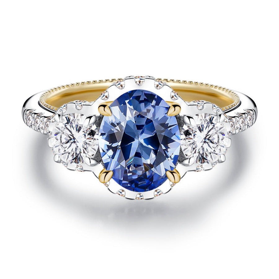 Vintage Two-Tone Oval Cut Sapphire and Moissanite Engagement Ring