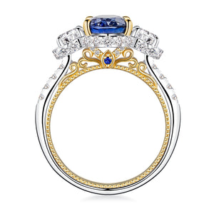 Vintage Two-Tone Oval Cut Sapphire and Moissanite Engagement Ring