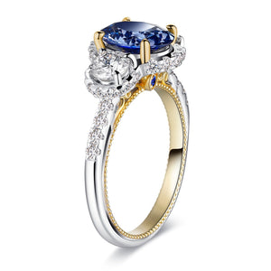 Vintage Two-Tone Oval Cut Sapphire and Moissanite Engagement Ring