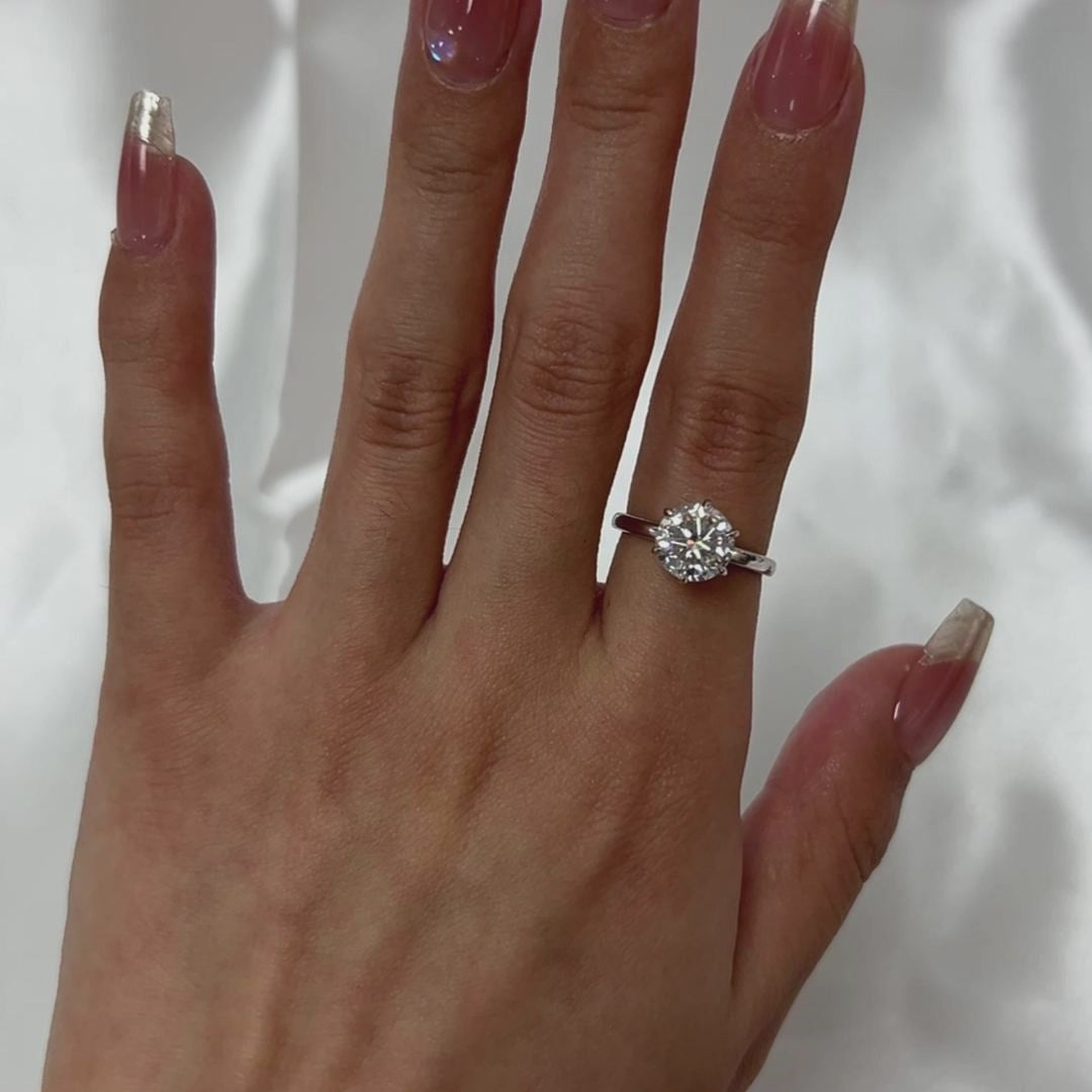 Six-Prong Solitaire Round Cut Engagement Ring With Hidden Halo