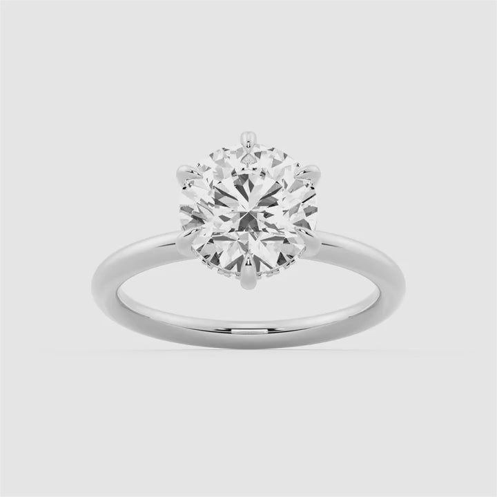 Six-Prong Solitaire Round Cut Engagement Ring With Hidden Halo