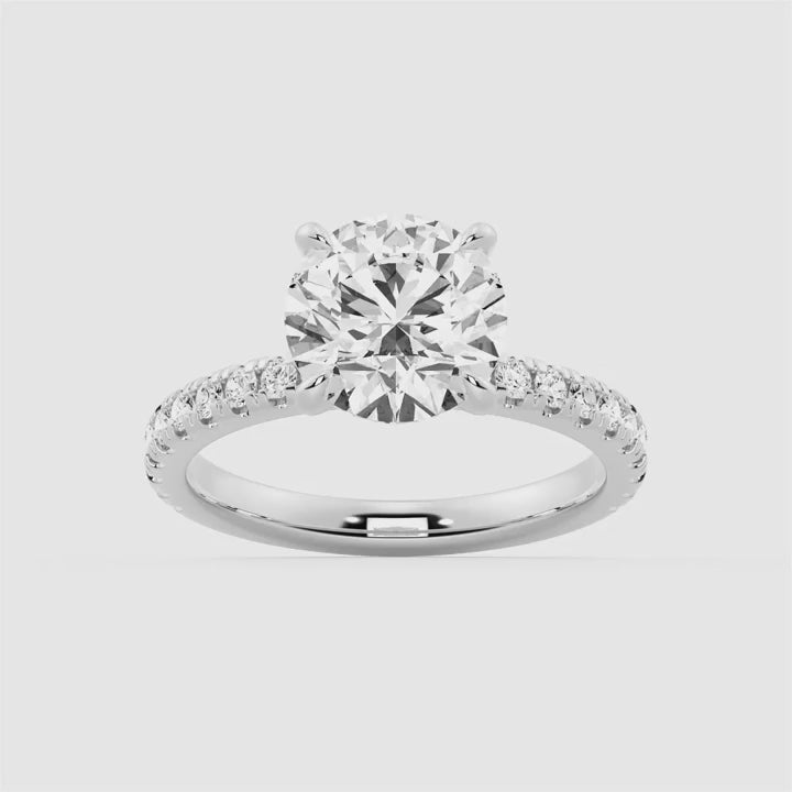 Pavé Set Round Moissanite Engagement Ring With Hidden Halo